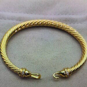 Bold Gold Twisted Ram Head Bangle